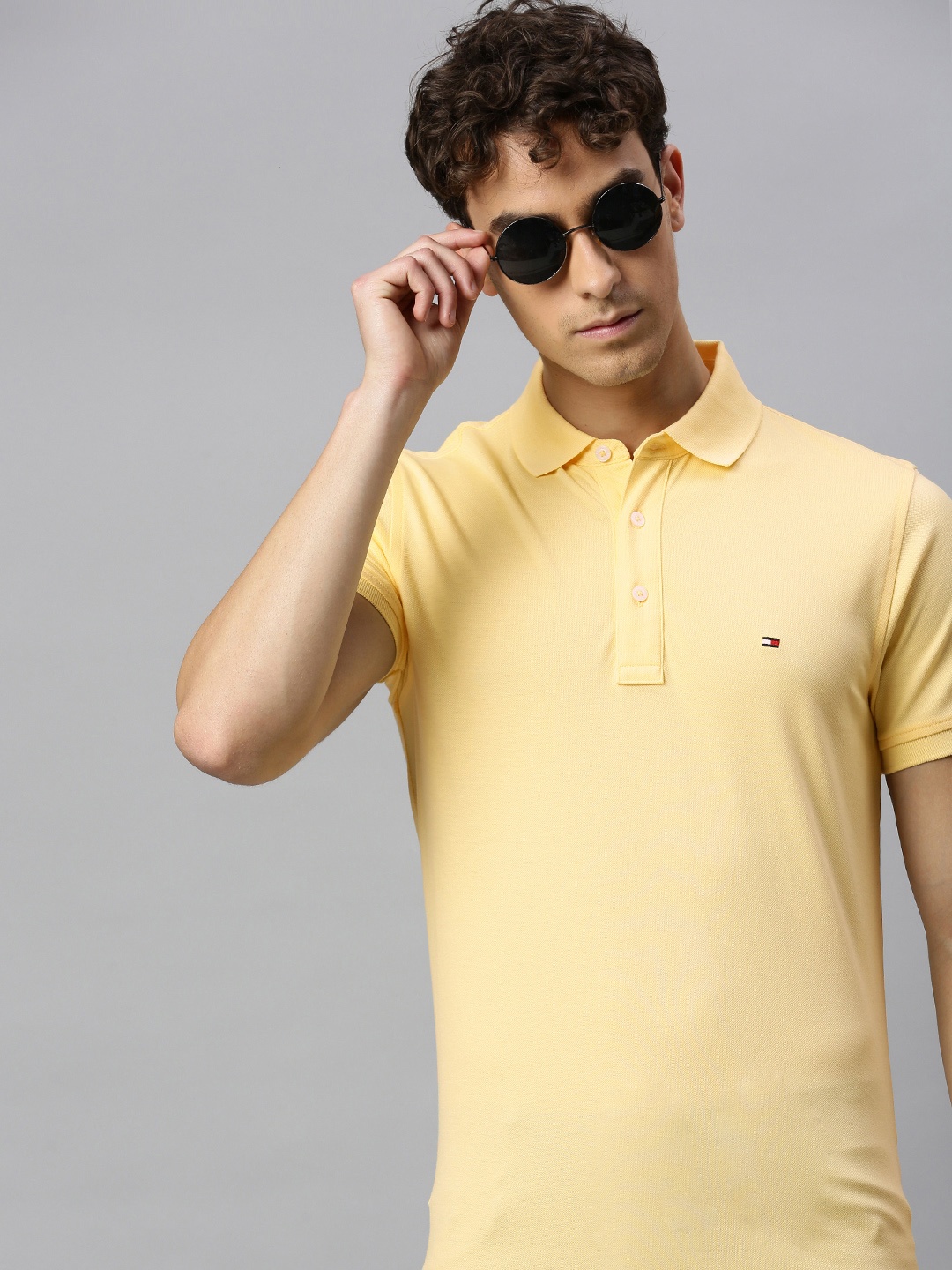 

Tommy Hilfiger Men Yellow Solid Slim Fit Polo Collar Pure Cotton T-shirt