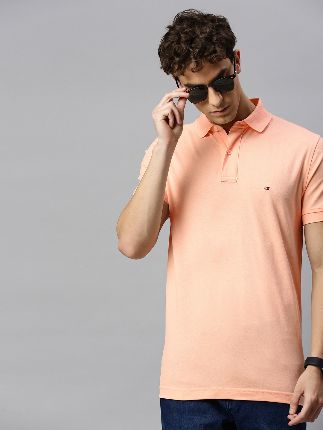 

Tommy Hilfiger Men Peach-Coloured Solid Polo Collar Organic Cotton T-shirt
