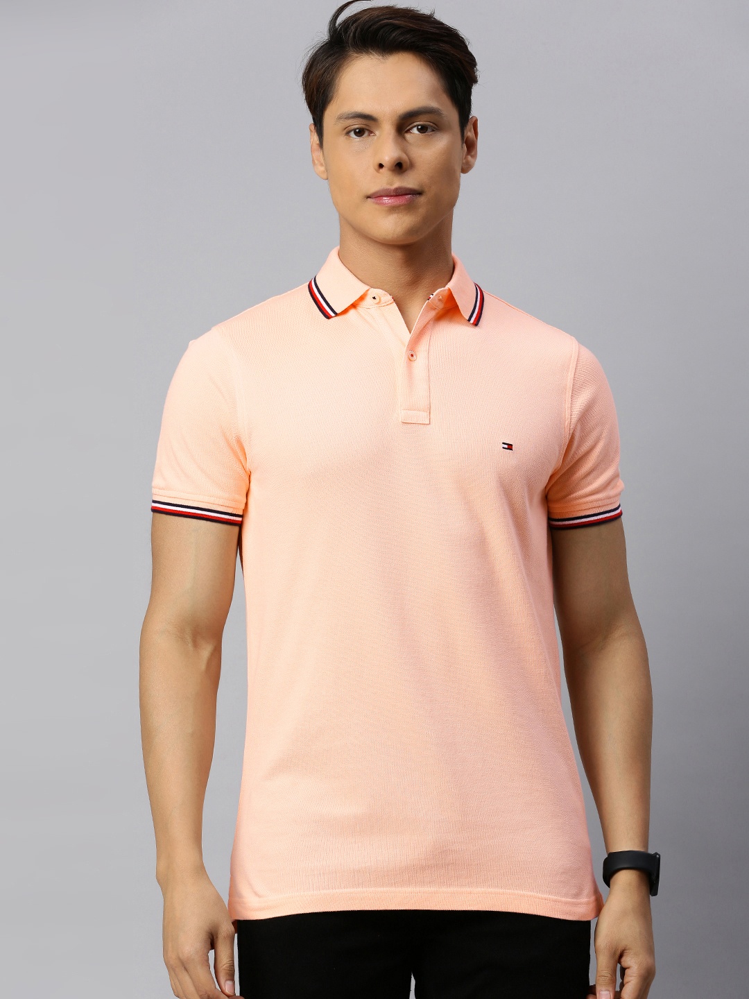 

Tommy Hilfiger Men Peach-Coloured Solid Slim Fit Pure Cotton Polo Collar Pure Cotton T-shirt