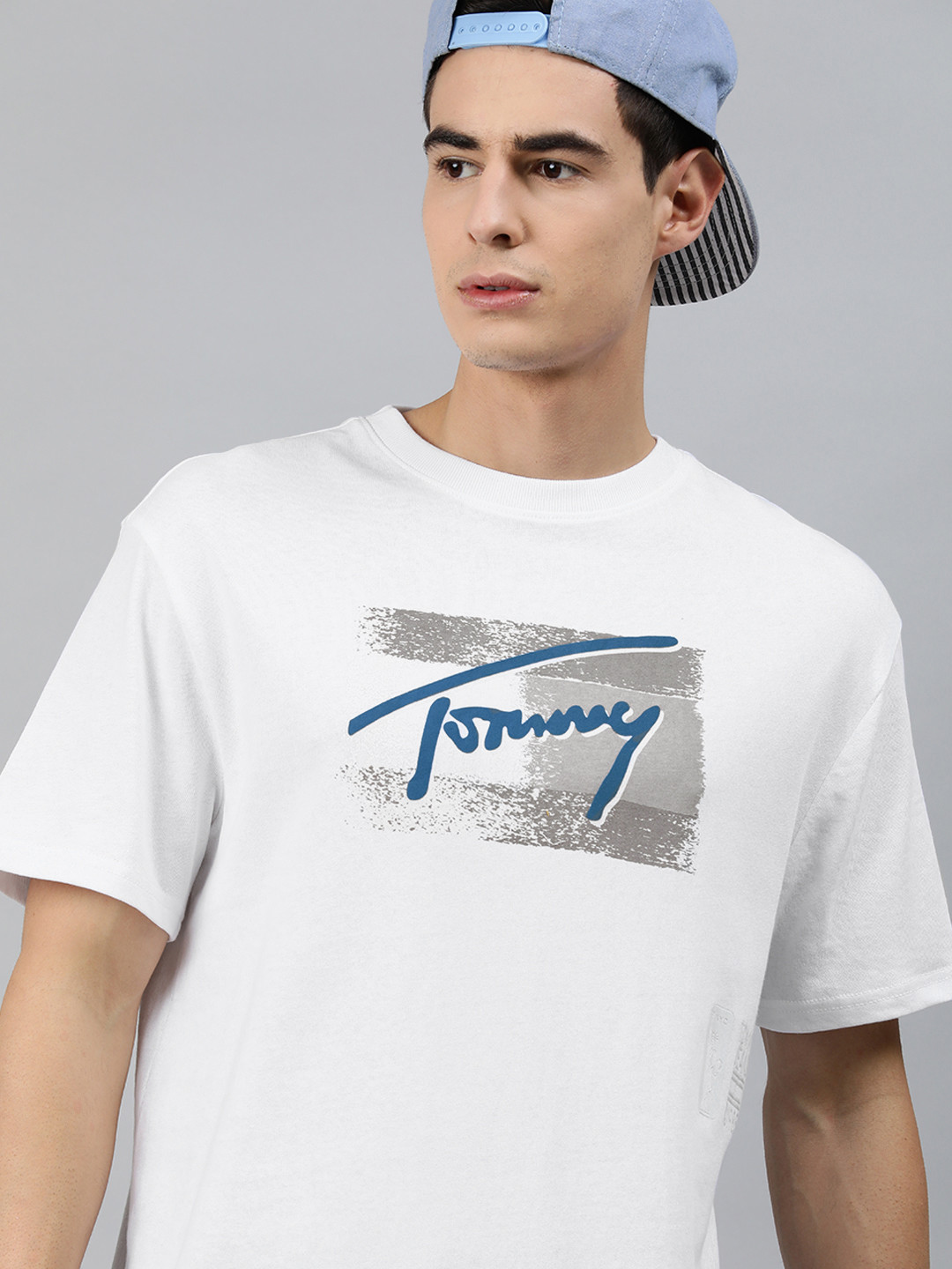 

Tommy Hilfiger Men White Brand Logo Printed Round Neck Pure Cotton T-shirt