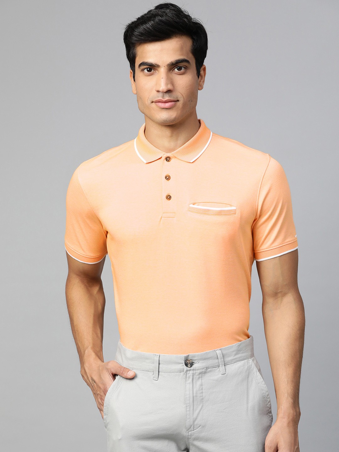 

Van Heusen Men Peach-Coloured Solid Polo Collar T-shirt