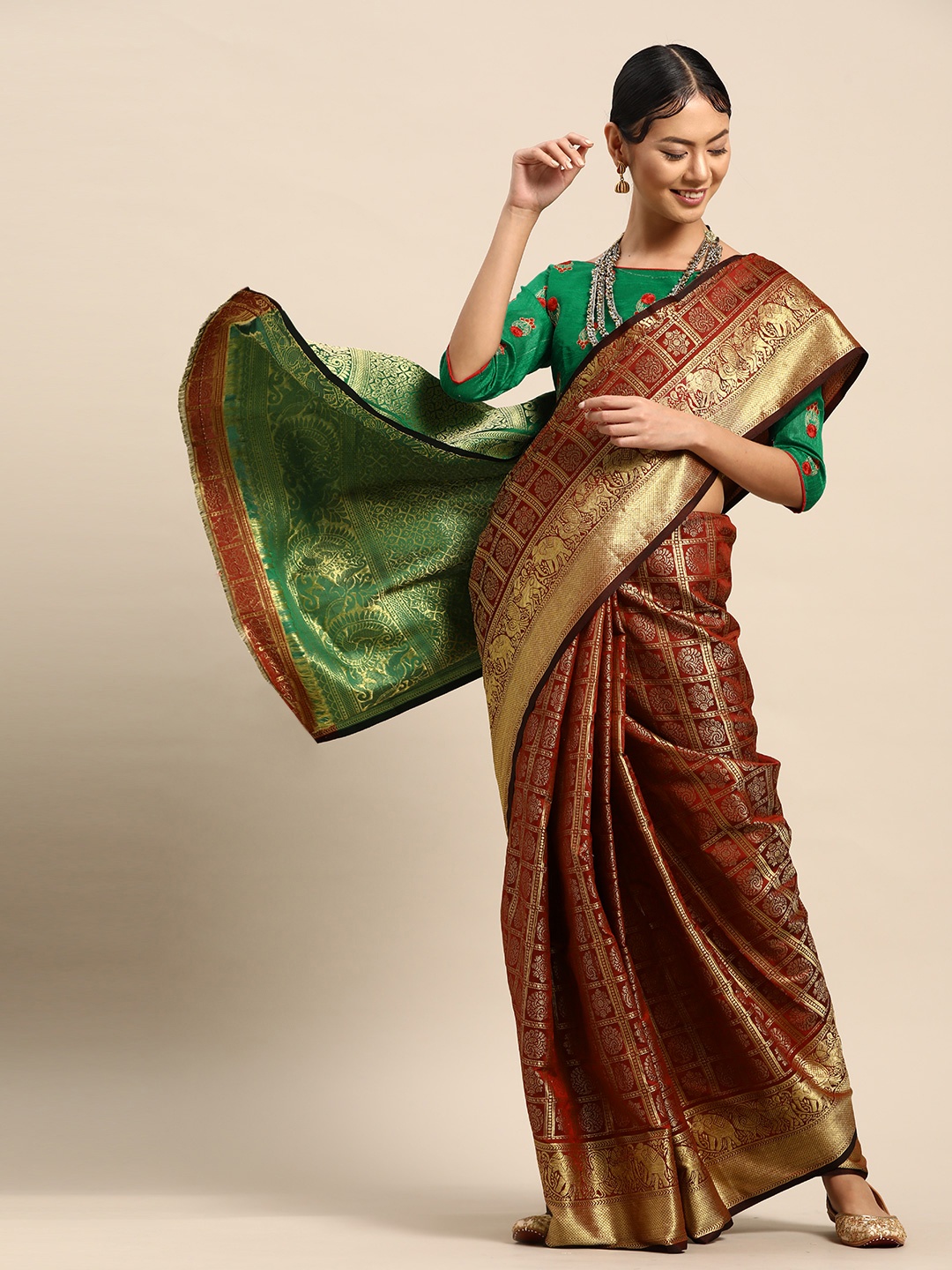 

SHAVYA Maroon & Golden Silk Blend Woven Design Saree