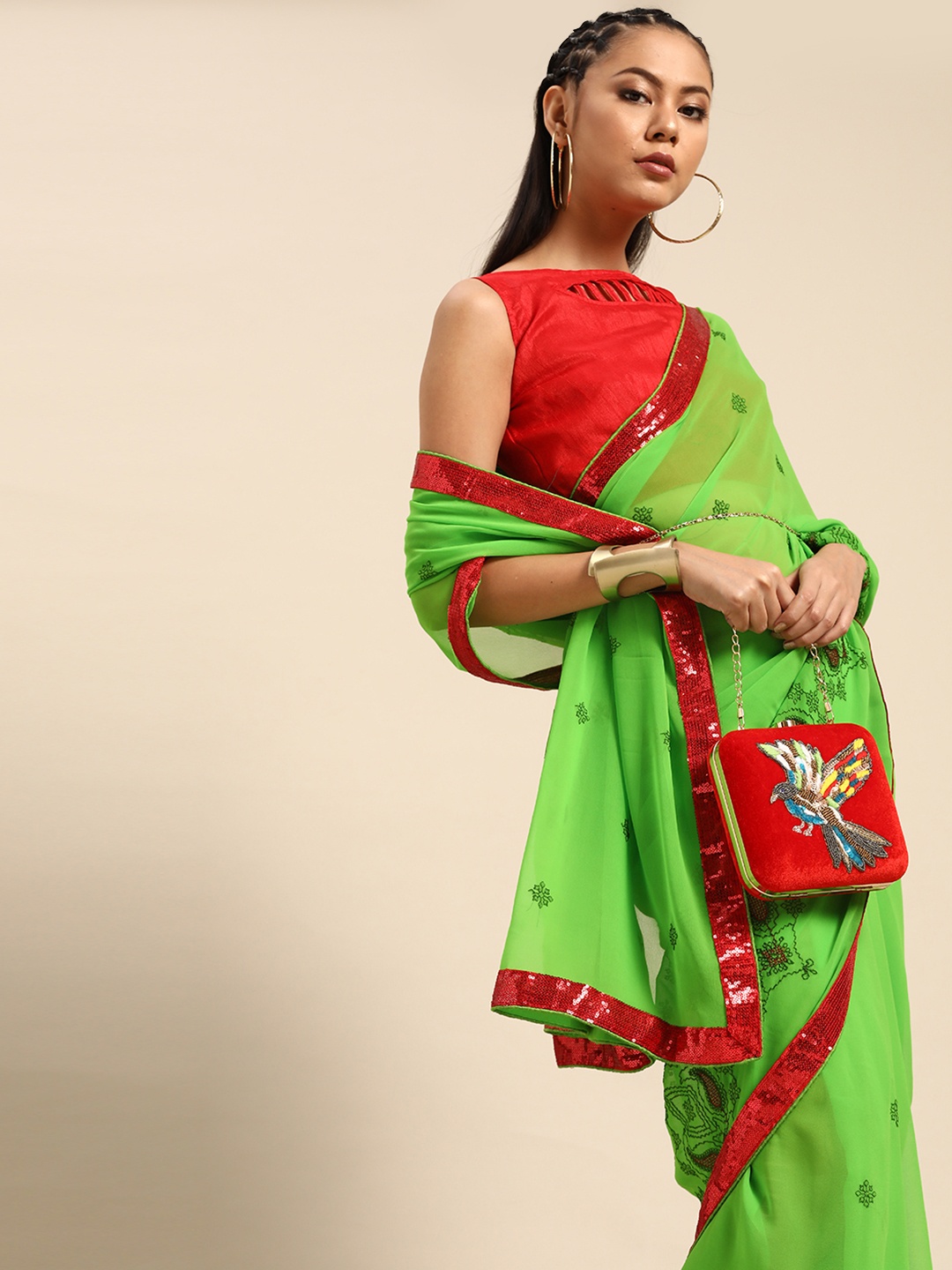 

SHAVYA Green & Red Ethnic Motifs Embroidered Saree