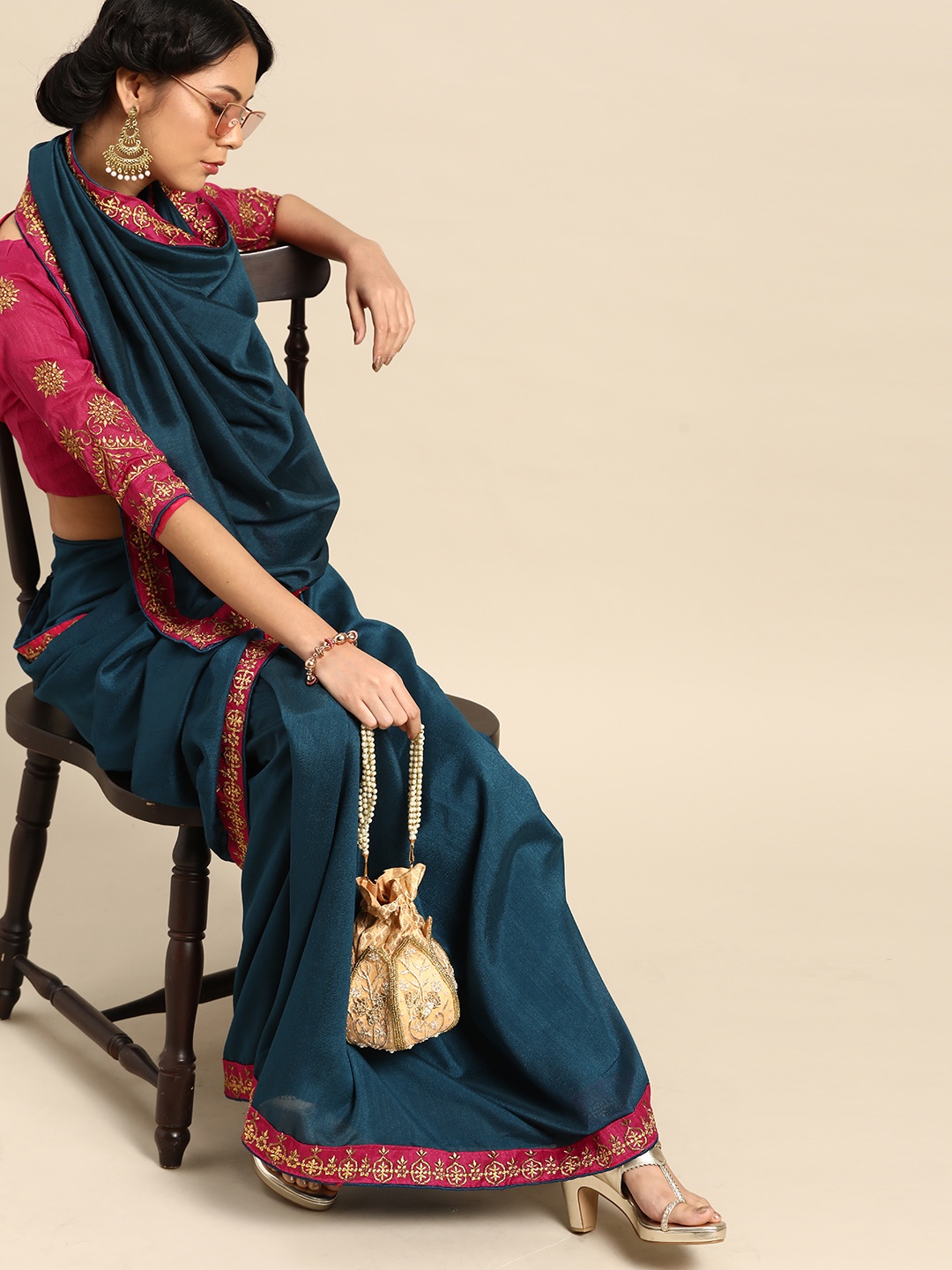 

SHAVYA Teal Blue & Pink Solid Saree