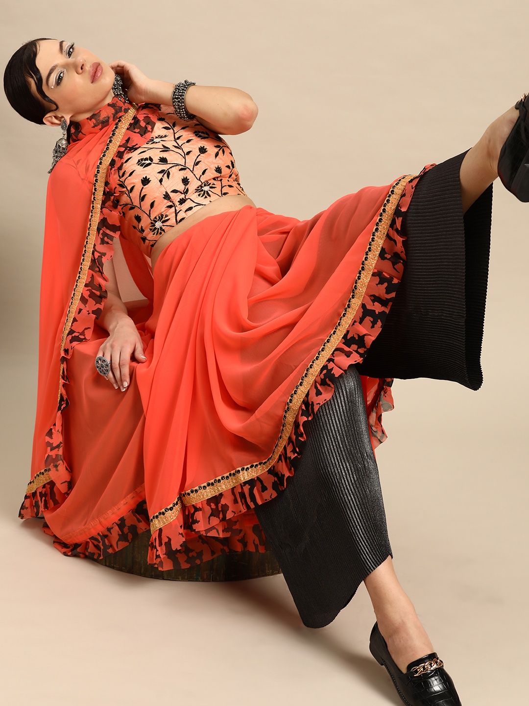 

SHAVYA Peach-Coloured Solid Pure Georgette Ruffled Saree
