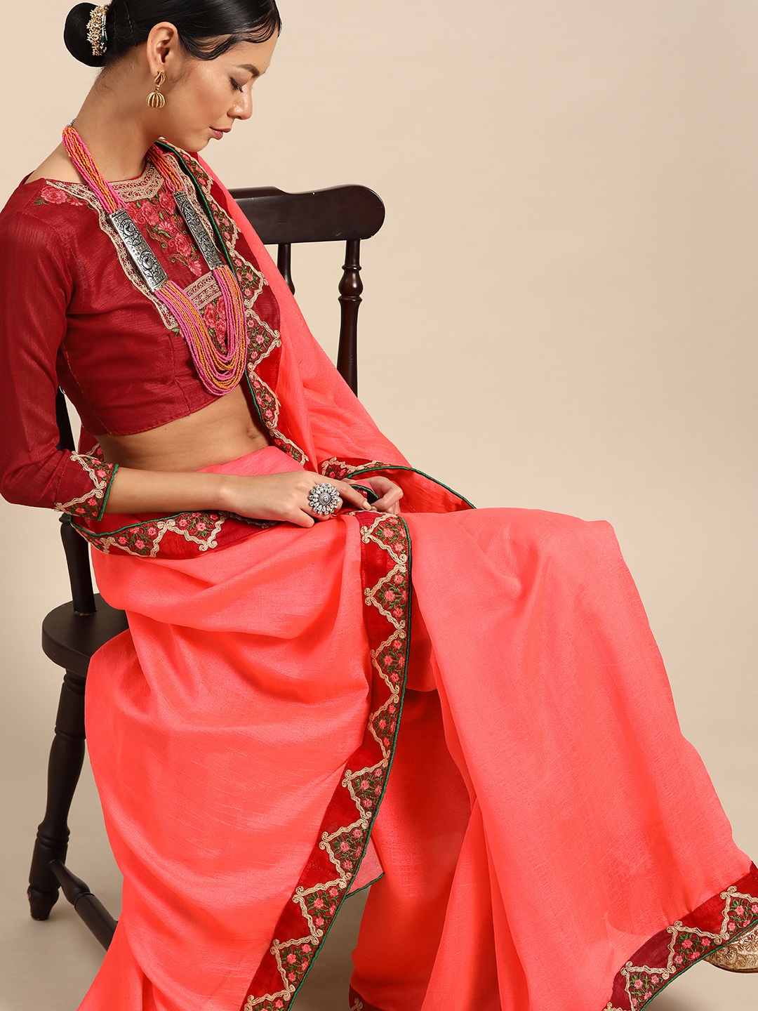 

SHAVYA Women Peach-Coloured Solid Silk Blend Saree with Embroidered Detail