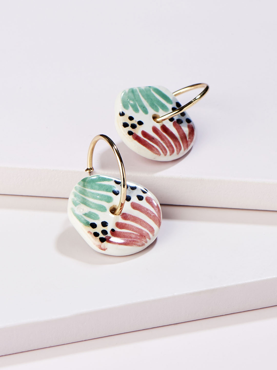 

Runway Ritual Red & Green Contemporary Studs