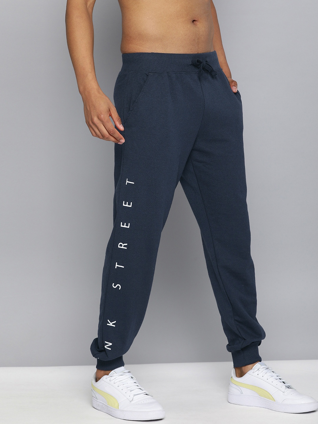 

Kook N Keech Men Navy Blue Printed Straight Fit Joggers
