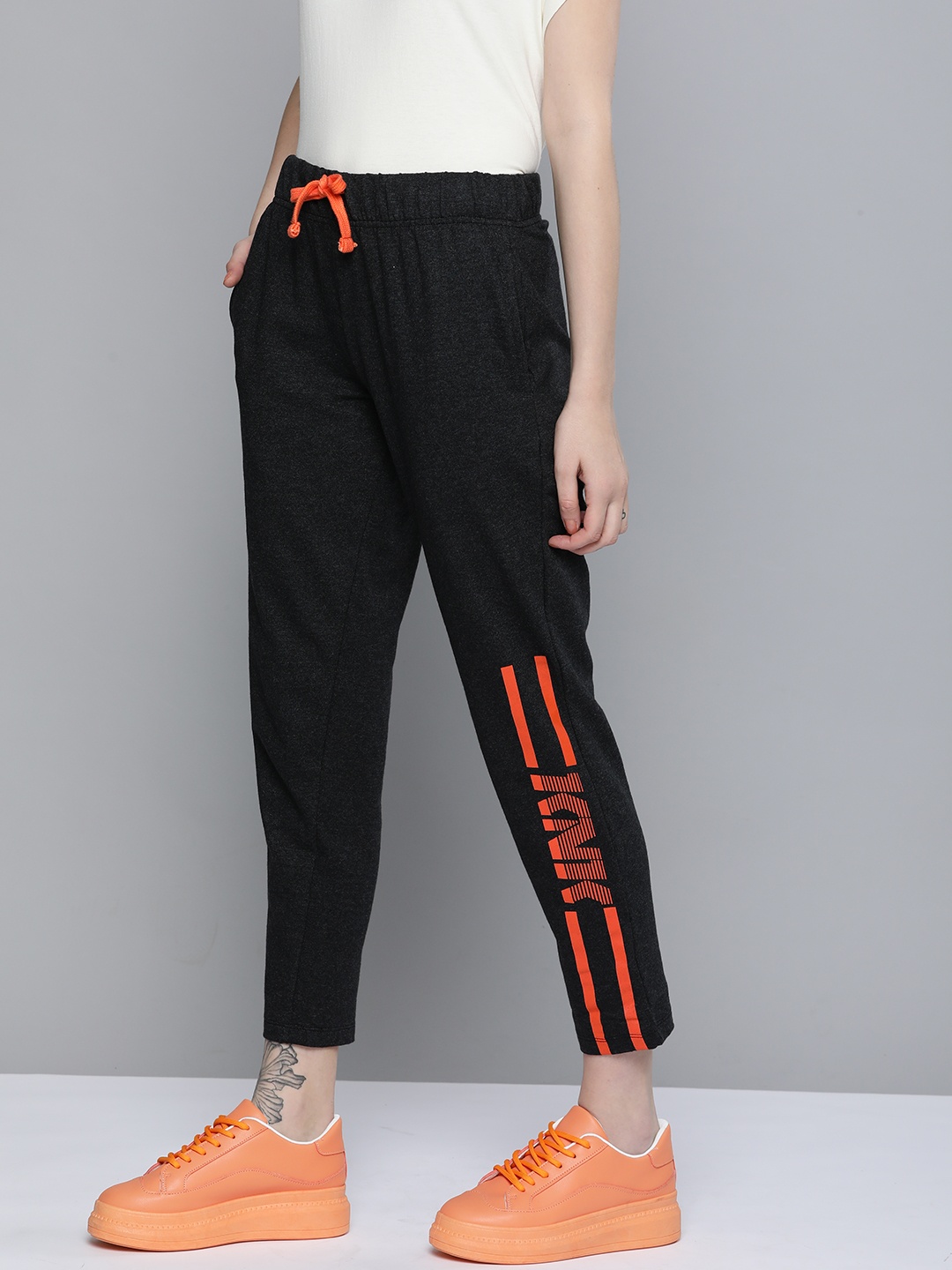 

Kook N Keech Men Charcoal & Orange Typography Printed Three-Fourth Track Pants