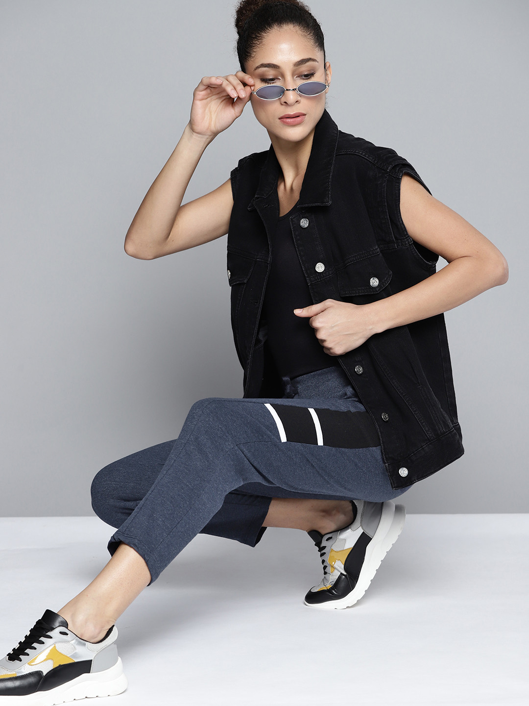 

Kook N Keech Women Black Solid Track Pants, Navy blue