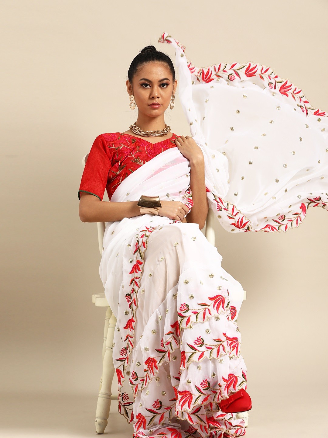 

SHAVYA White & Red Embroidered Sequinned Ruffle Saree