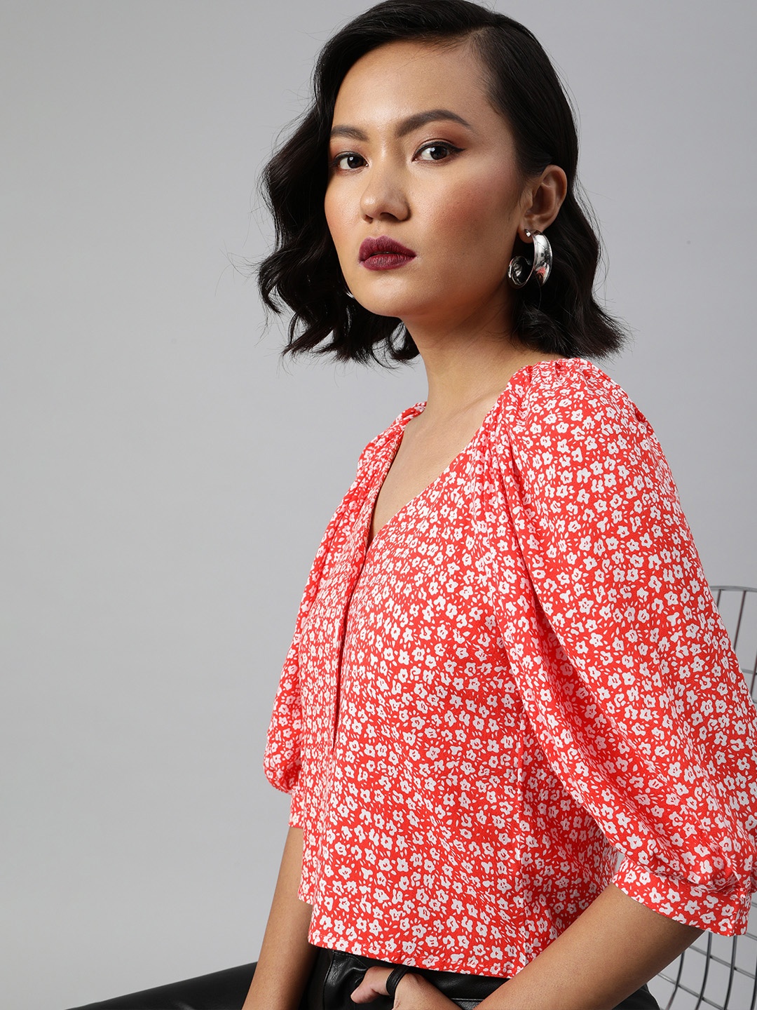 

Sera Orange & White Floral Printed Puff Sleeves Blouson Crop Top