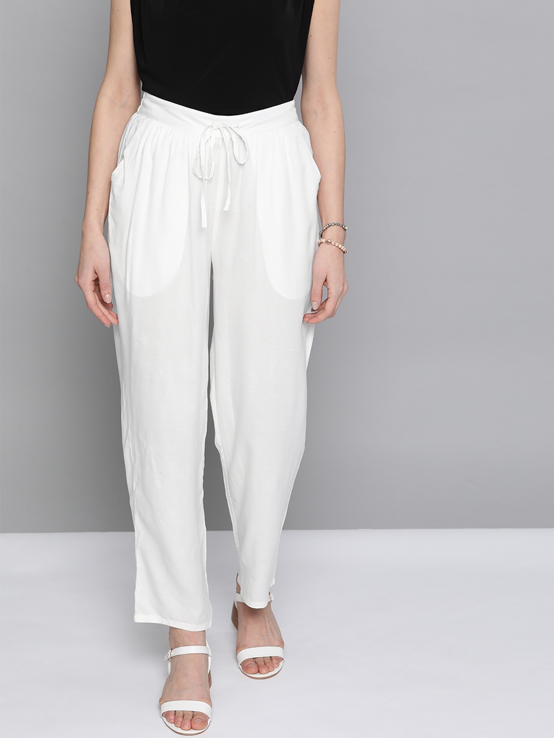 

HERE&NOW Women White Solid Straight Palazzos