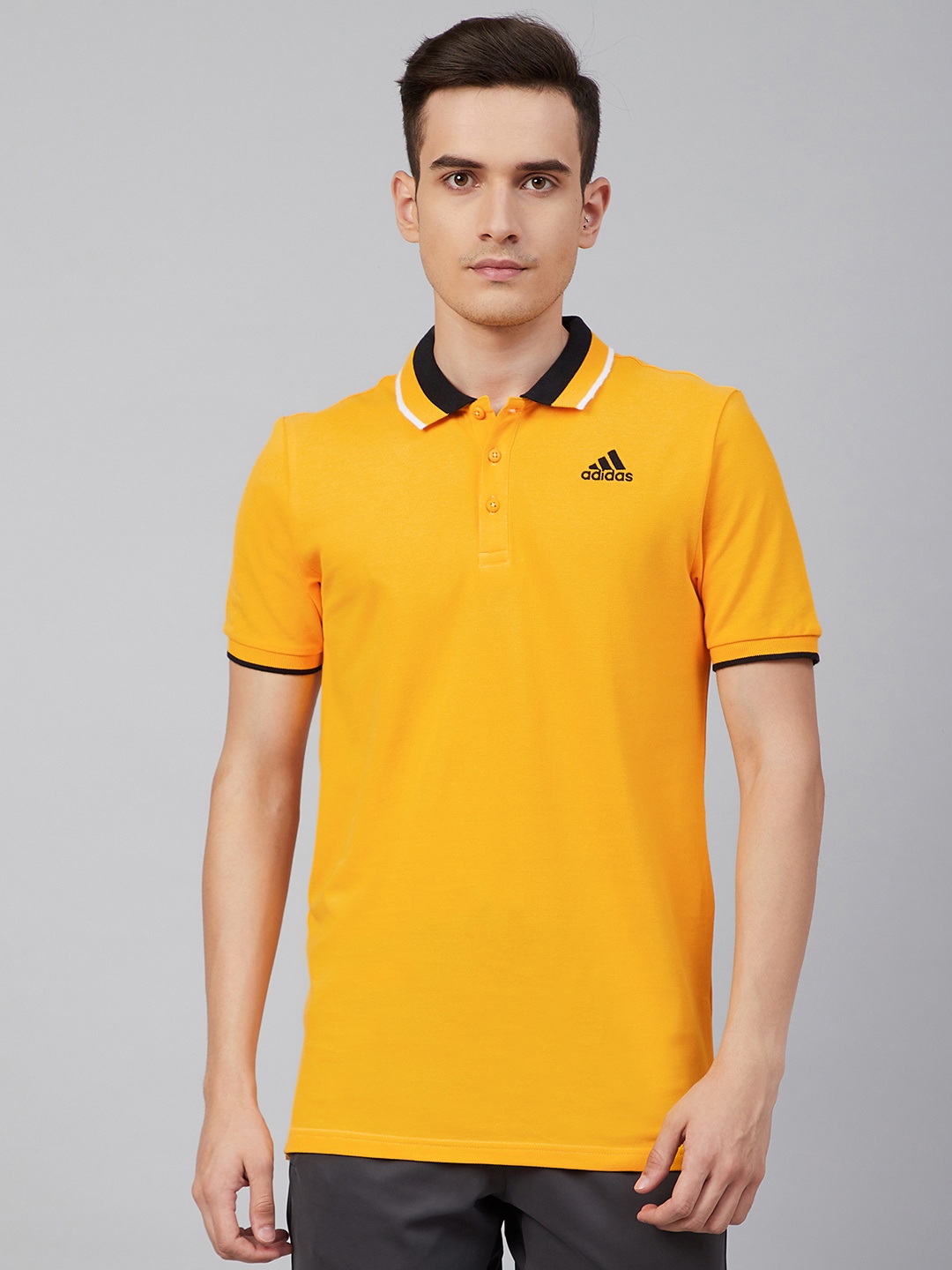 

ADIDAS Men Mustard Yellow Solid ESS Core Polo Collar Training Cotton T-shirt