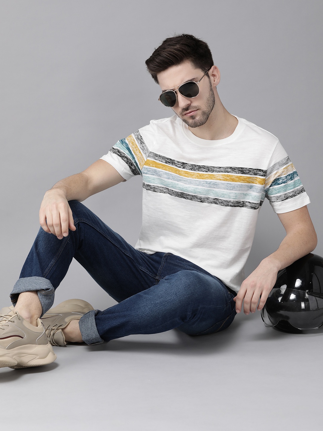 

Roadster Men White & Blue Striped Cotton T-shirt