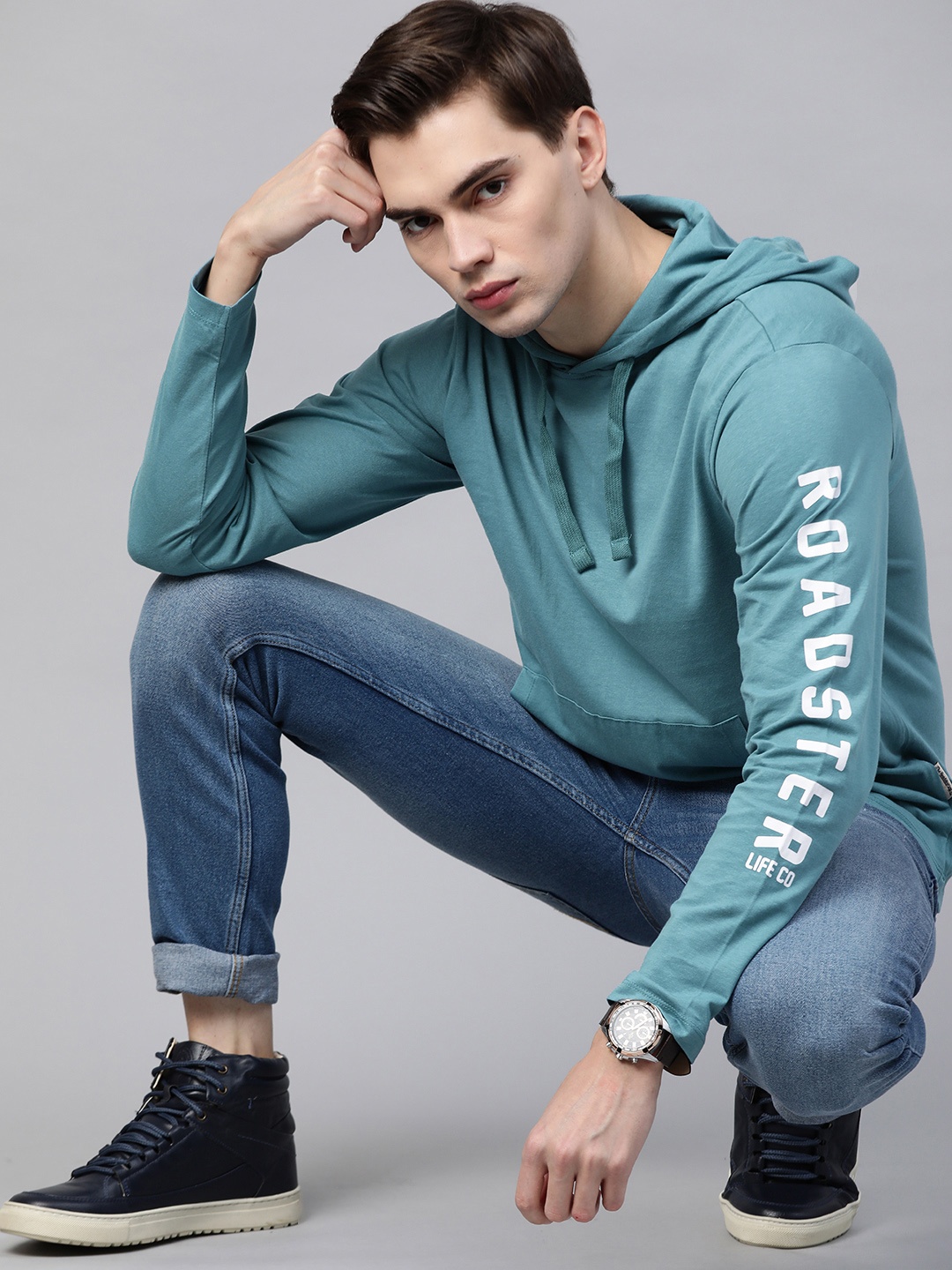 

Roadster Men Blue Solid Pure Cotton Hooded T-shirt