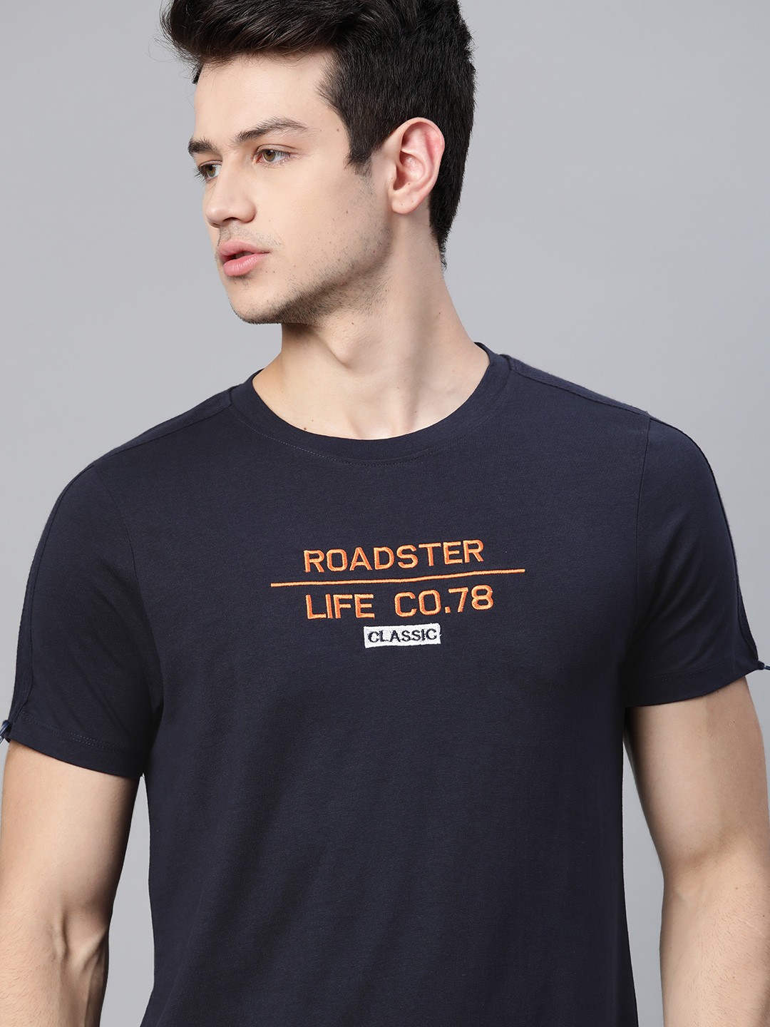 

Roadster Men Navy Blue Brand Logo Printed T-shirt