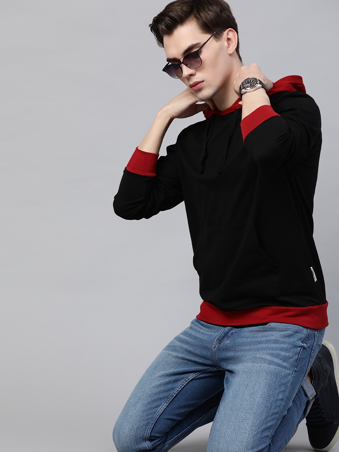 

Roadster Men Black Solid Pure Cotton Hodded T-shirt