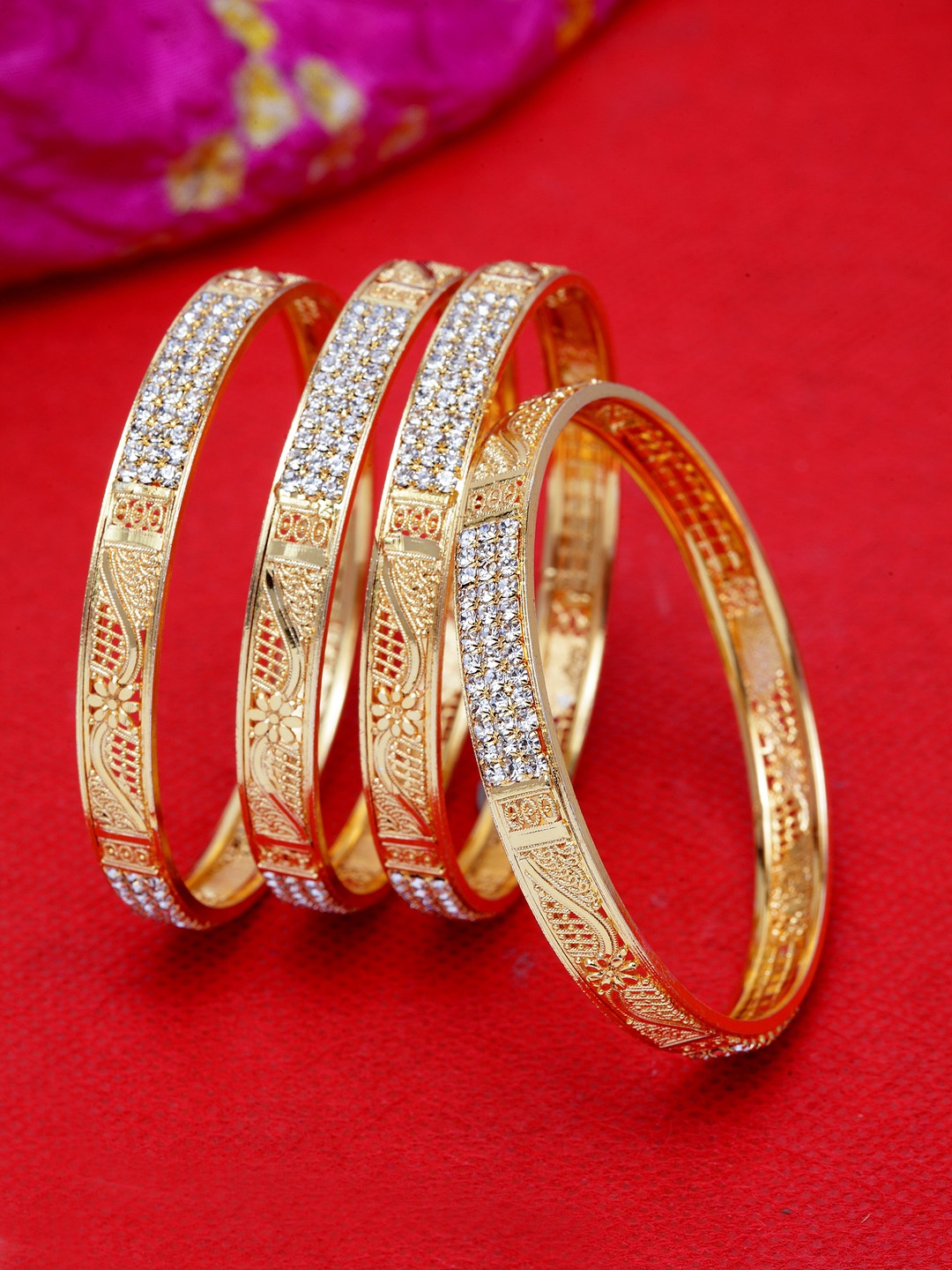 

Shining Diva Gold-Plated Artificial Stone Studded Antique Bangles