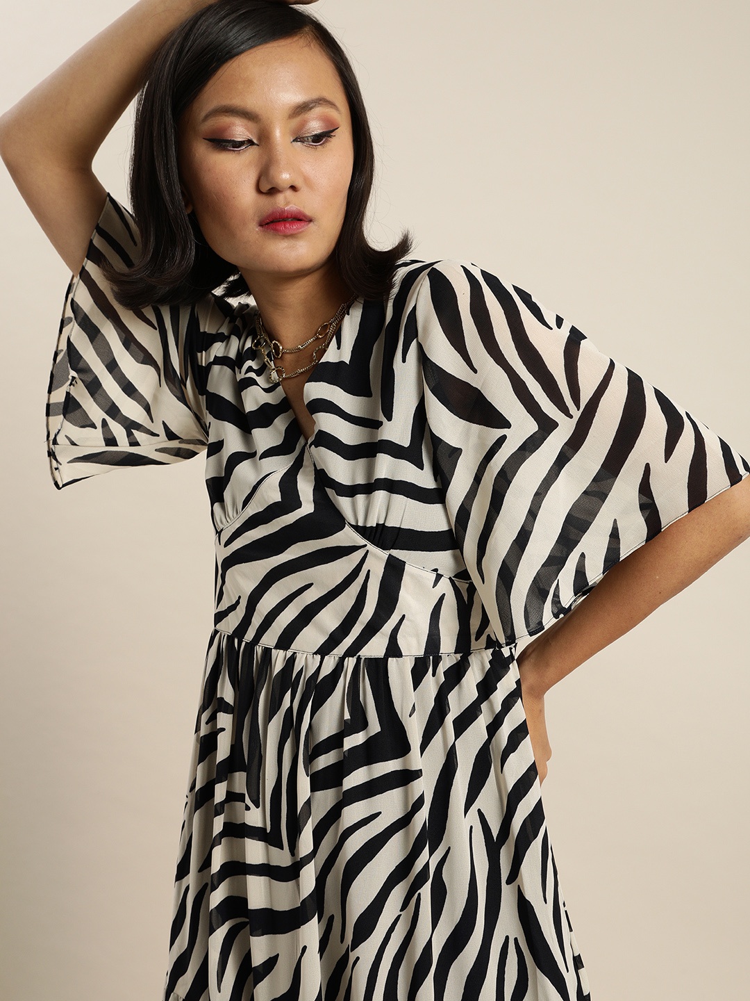 

Marie Claire Snazzy White and Black Animal Printed Tiered Maxi Dress
