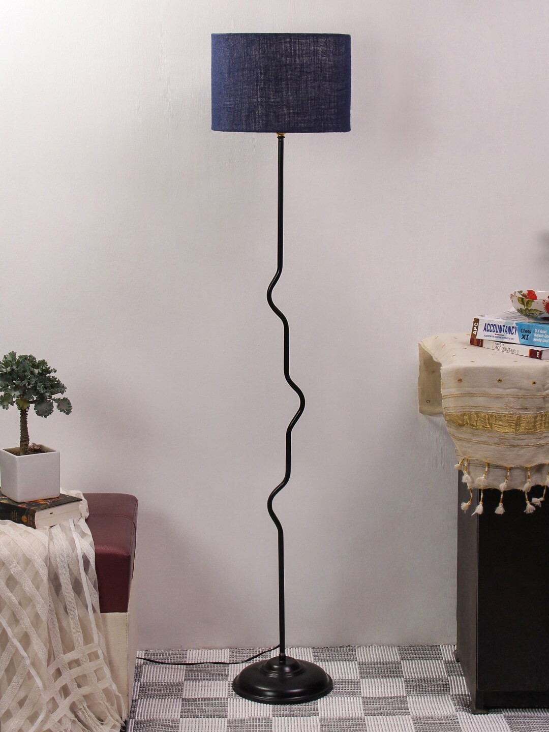 

Devansh Navy Blue & Black Solid Cylindrical Novelty Lamp