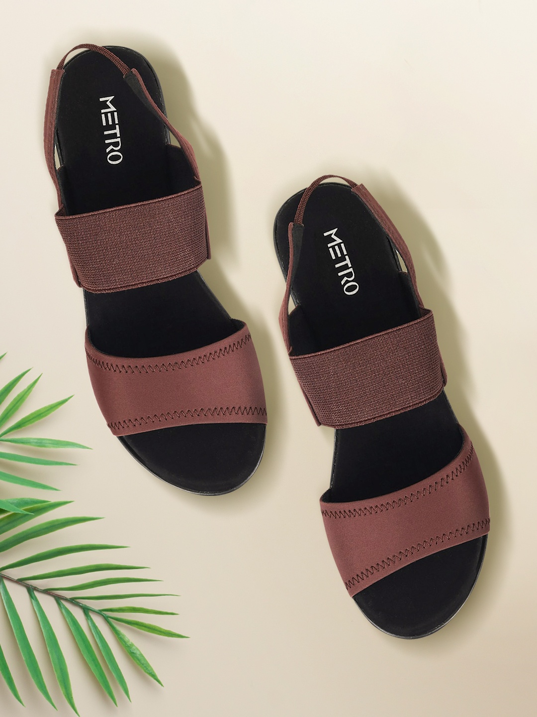 

Metro Women Brown & Black Solid Platform Heels