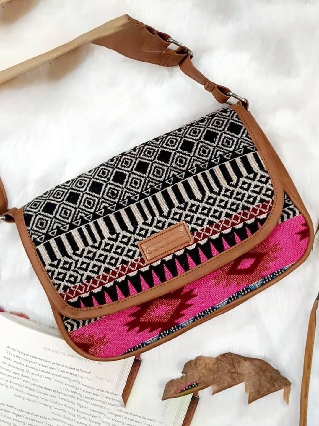 

ASTRID White & Navy Blue Self Design Sling Bag