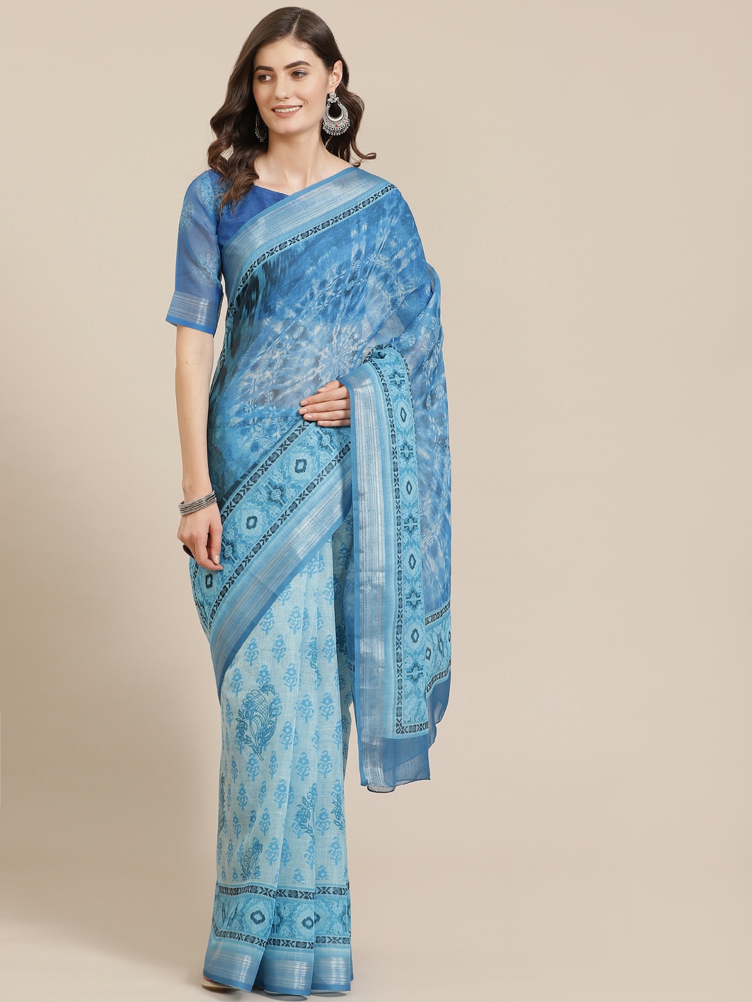

Mitera Blue Printed Muga Saree