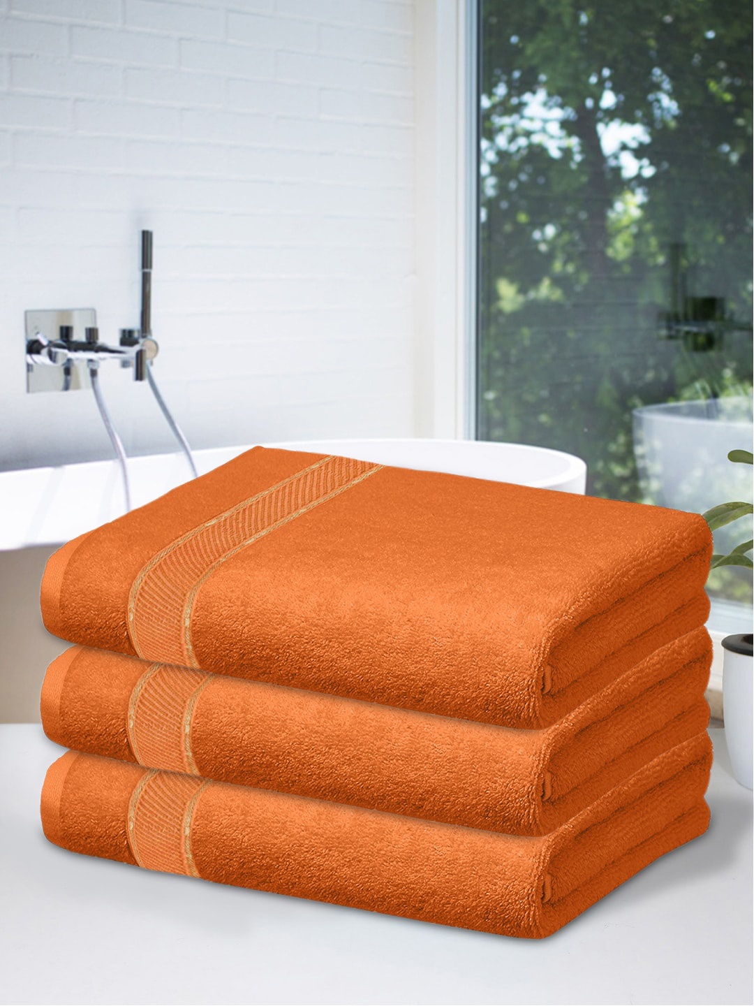 

Kuber Industries Set Of 3 Orange Solid 500 GSM Bath Towels