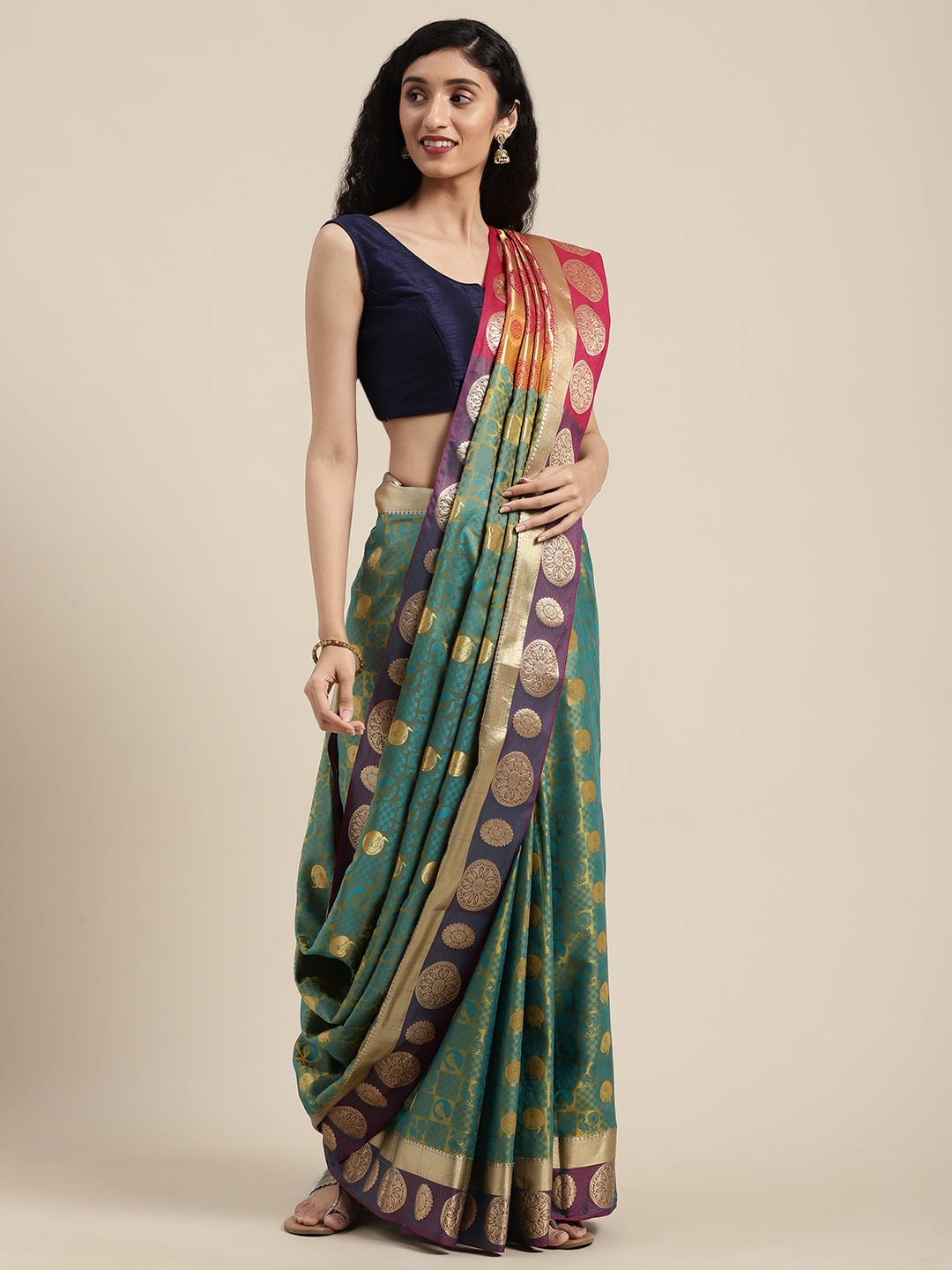 

Mitera Teal Green & Golden Art Silk Woven Design Kanjeevaram Saree