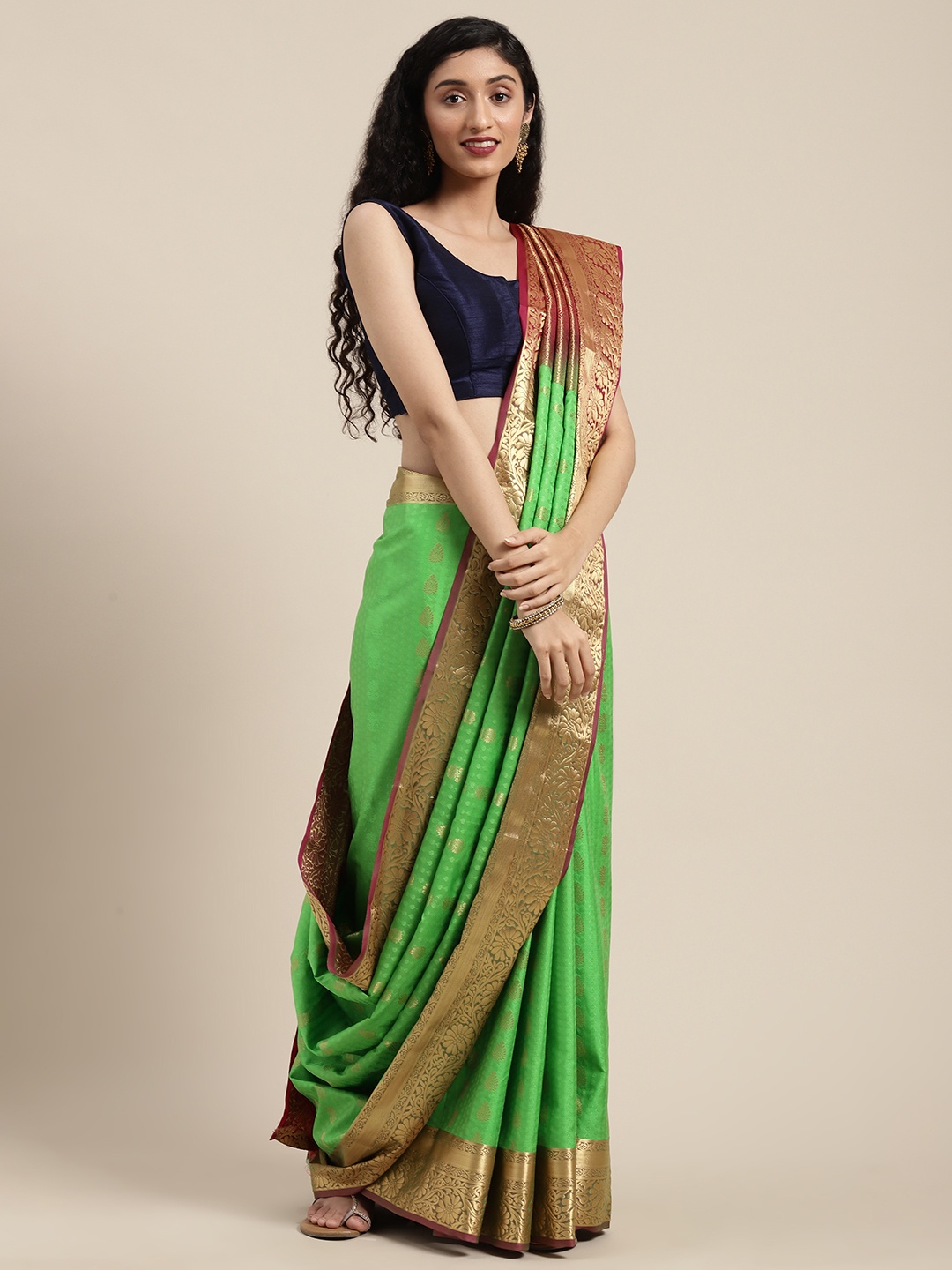 

Mitera Green & Golden Art Silk Woven Design Kanjeevaram Saree