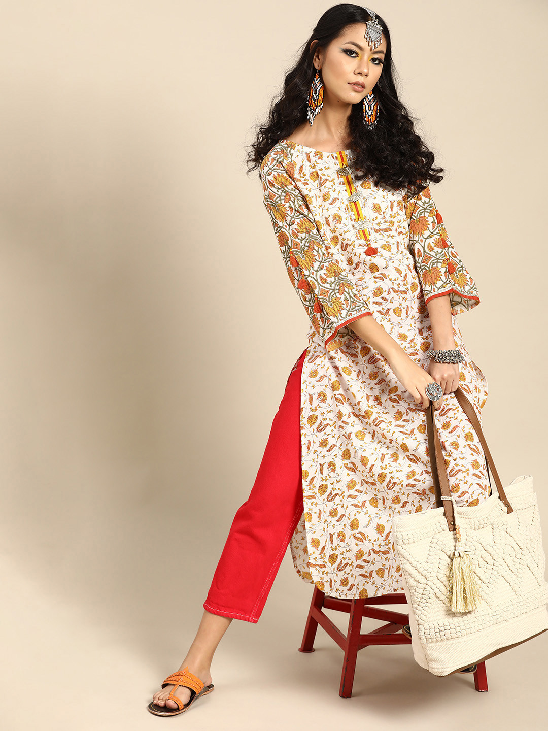 

Varanga Women White & Orange Ethnic Motifs Printed Cotton Flared Sleeves Kurta