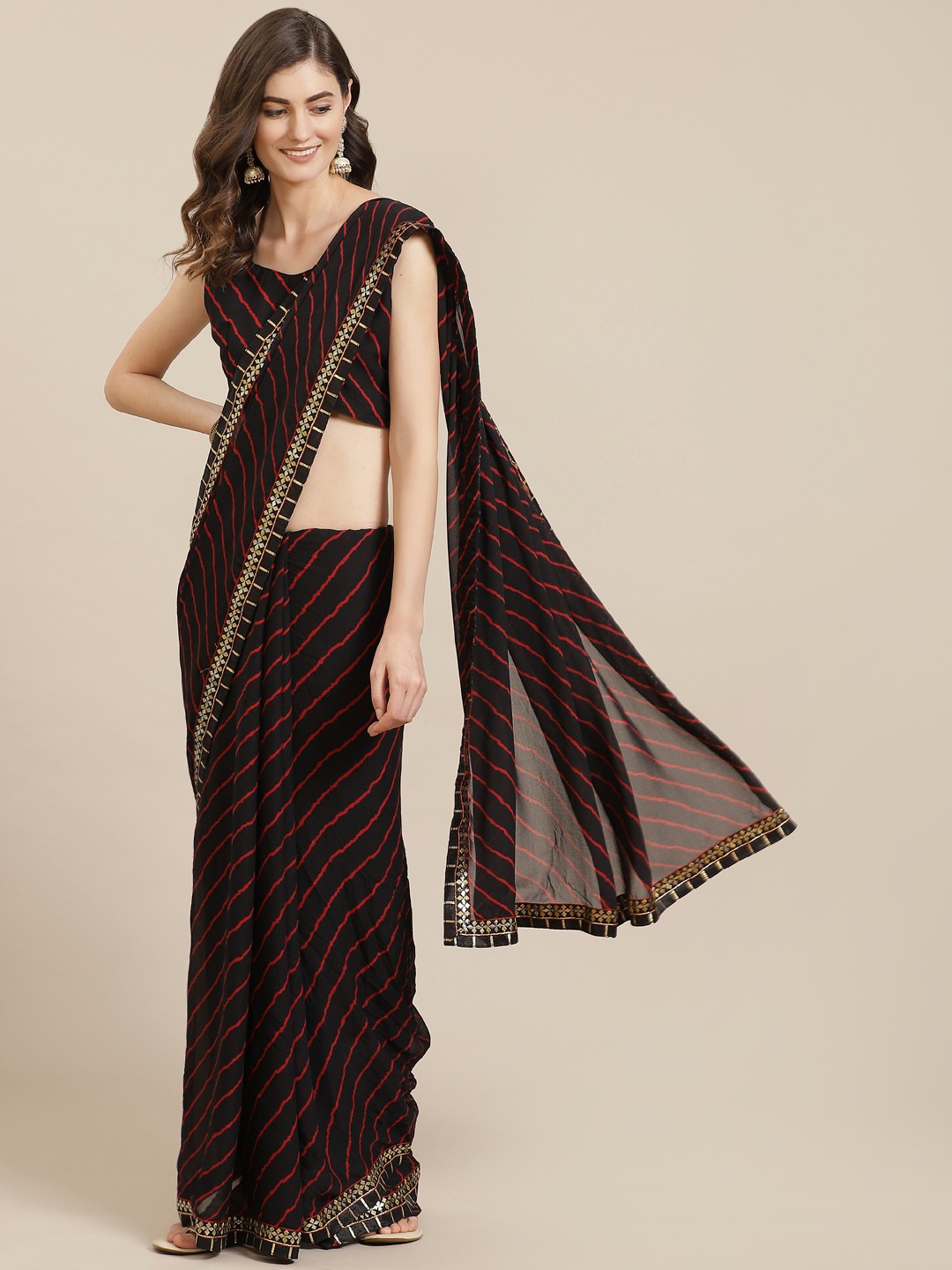 

Kalista Black & Red Striped Saree