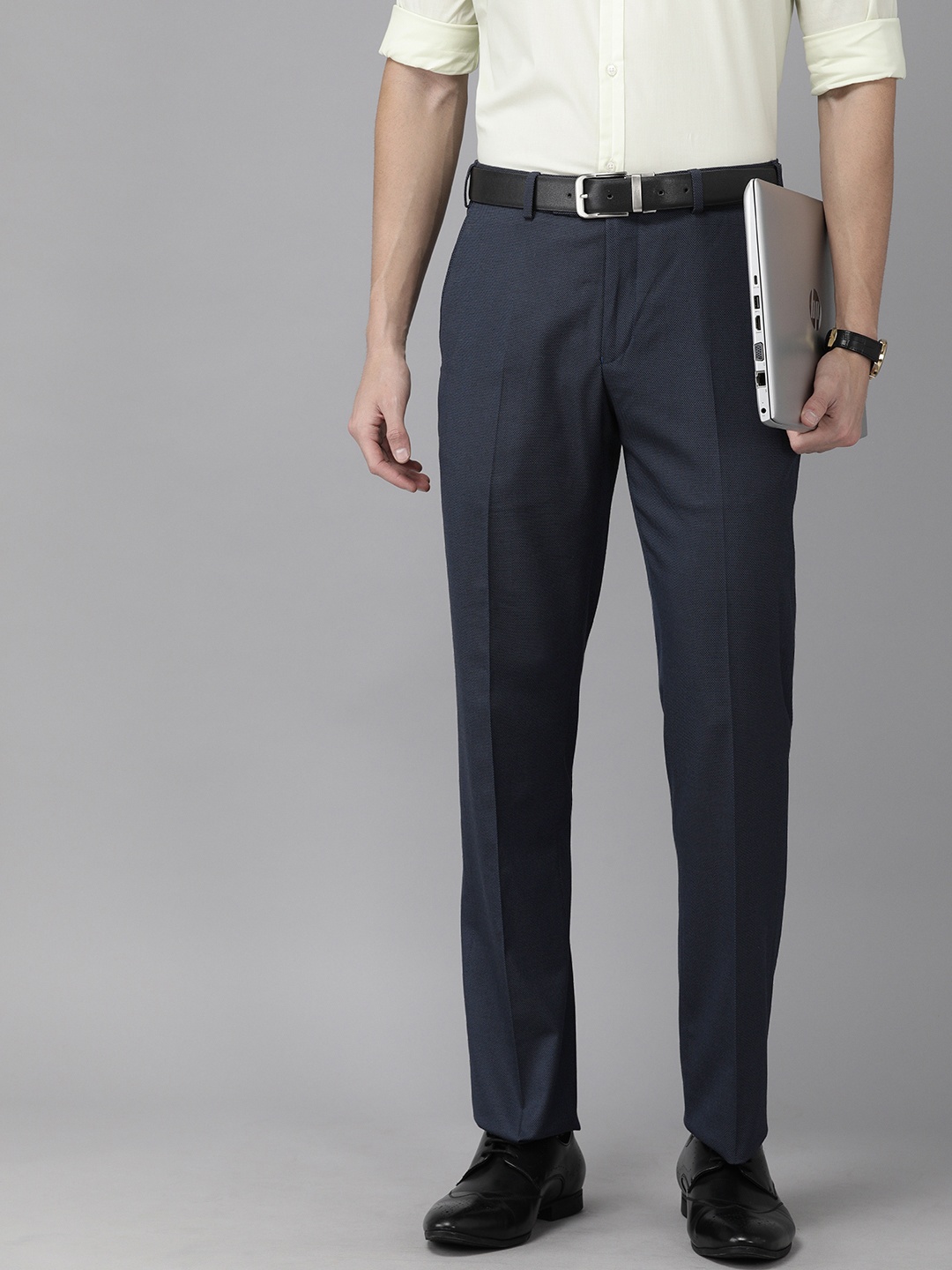 

Park Avenue Men Navy Blue Regular Fit Self Design Formal Trousers