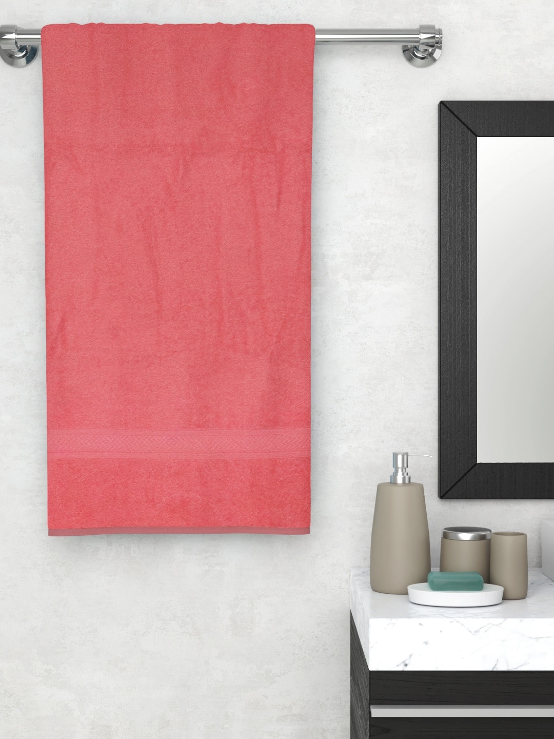 

Raymond Home Coral Pink Solid 450 GSM Bath Towel