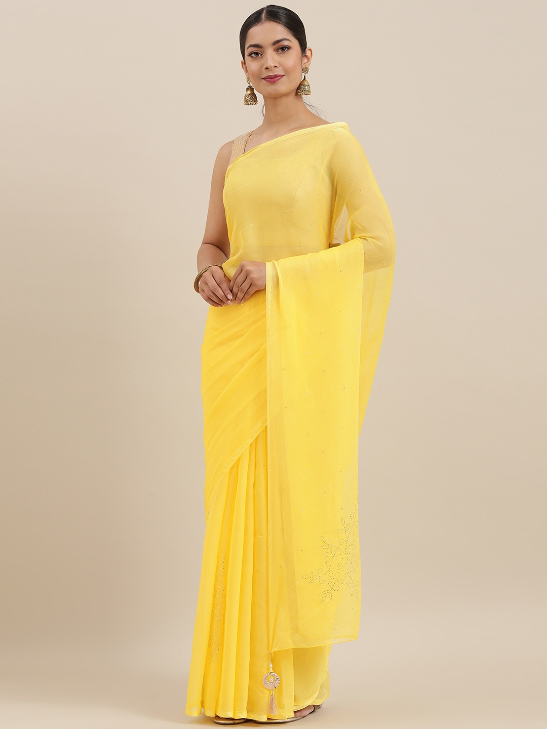 

Mitera Yellow Hand Embellished Georgette Sustainable Saree