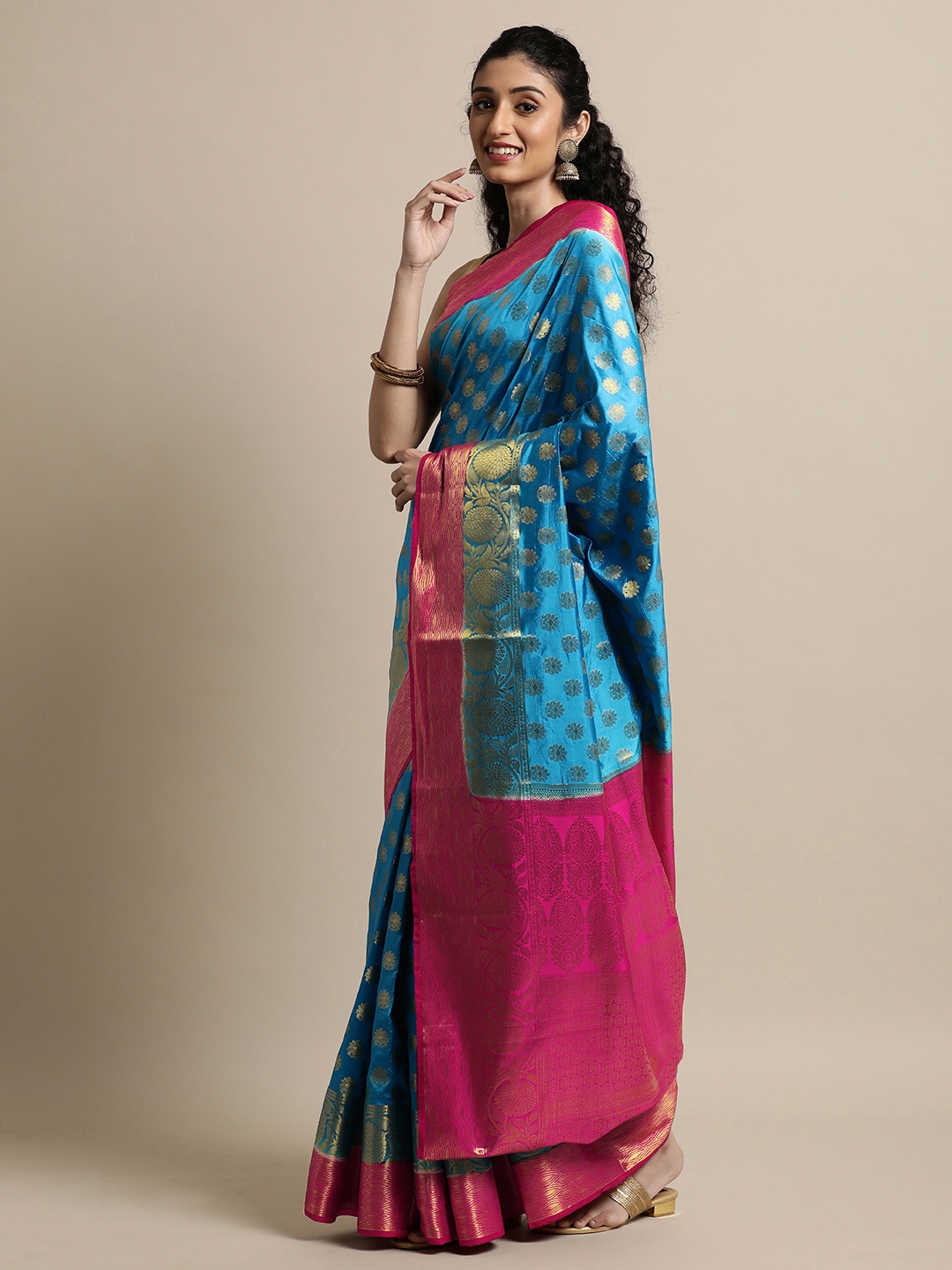 

Mitera Turquoise Blue & Pink Woven Design Zari Silk Blend Banarasi Saree