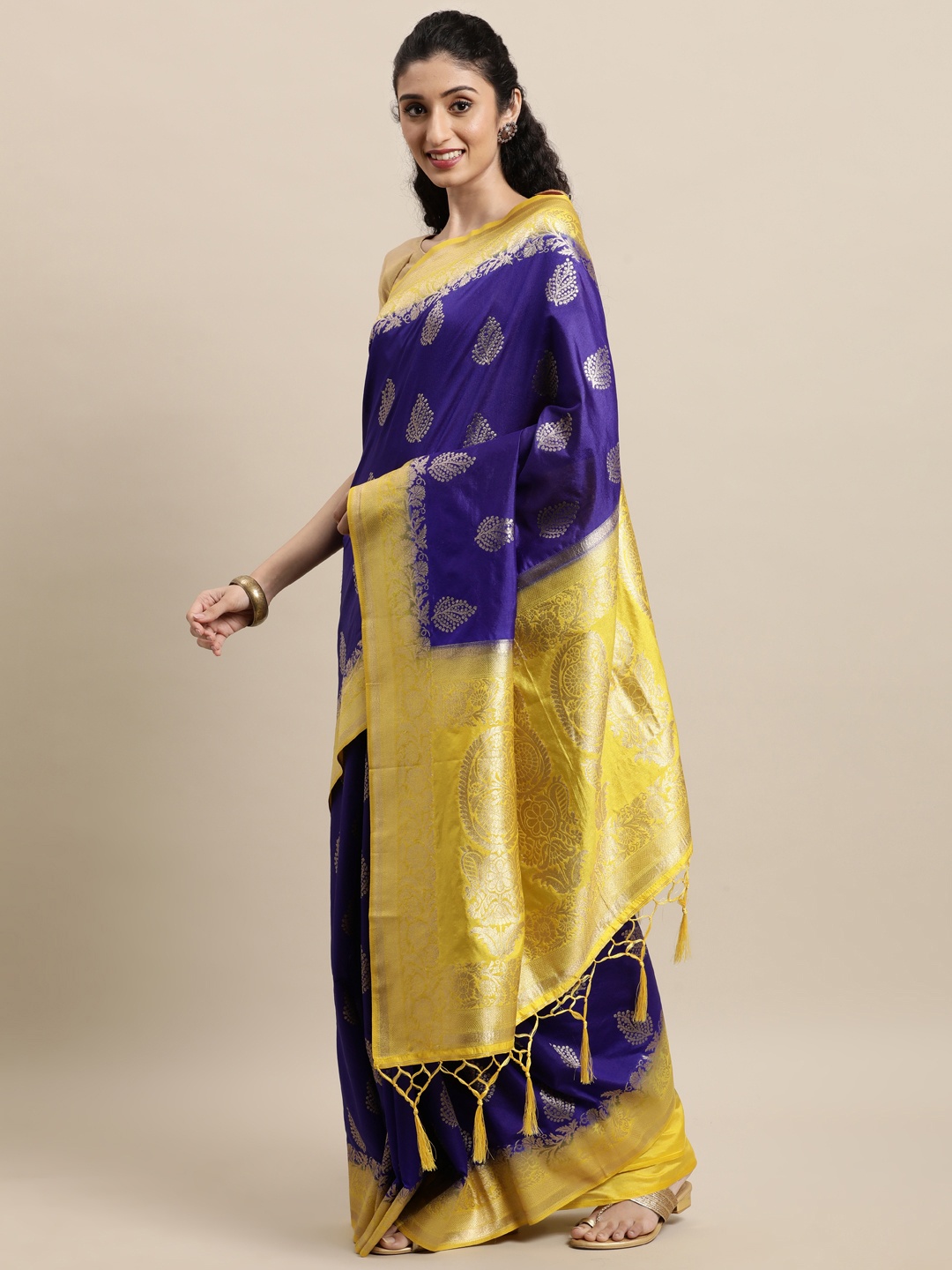 

Mitera Blue & Yellow Ethnic Motifs Zari Silk Blend Banarasi Saree