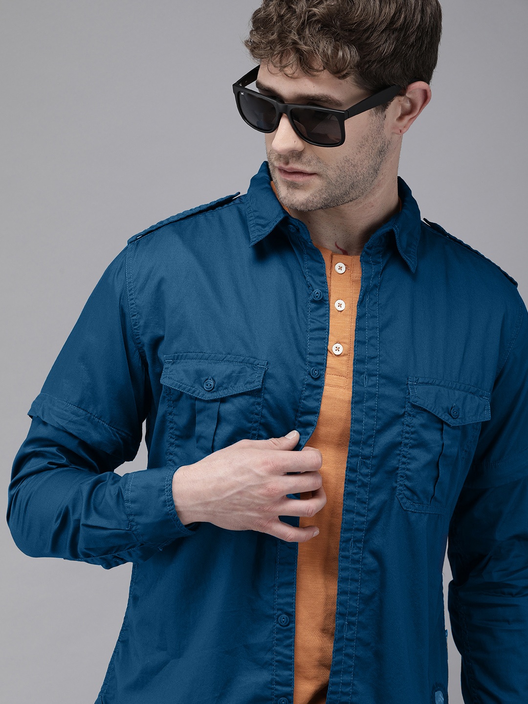 

Roadster x Discovery Adventures Mens Dark Blue Stay Dry shirt with detachable sleeves, Teal