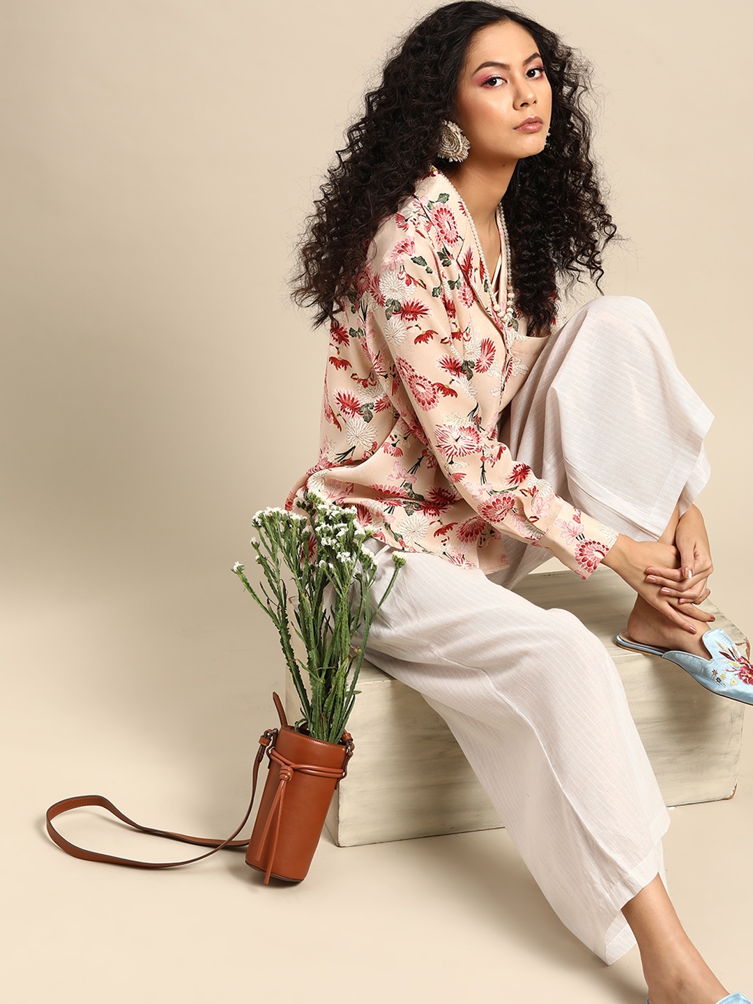 

Varanga Women Off-White Striped Wide Leg Palazzos