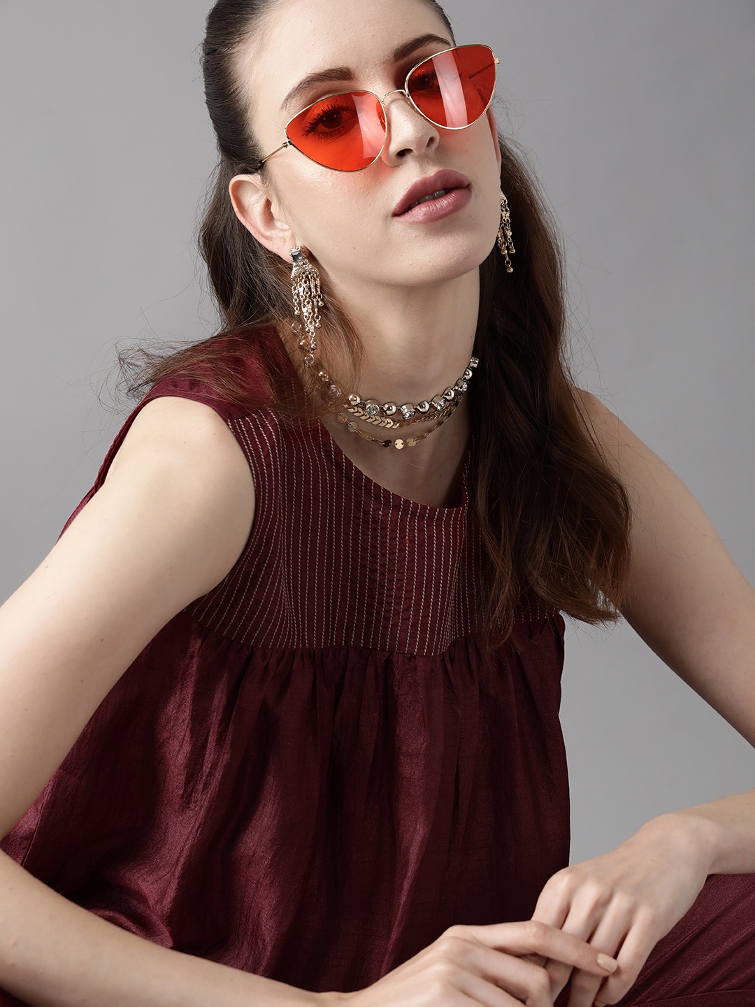 

Indo Era Women Maroon Solid Kurti with Trousers