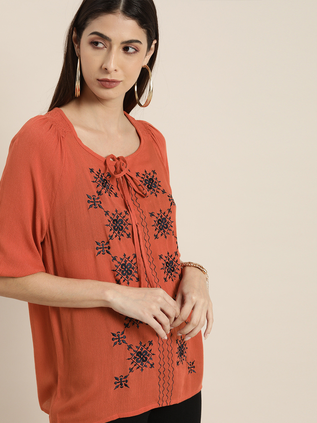 

all about you Women Orange & Navy Blue Embroidered Tie-Up Neck Regular Top