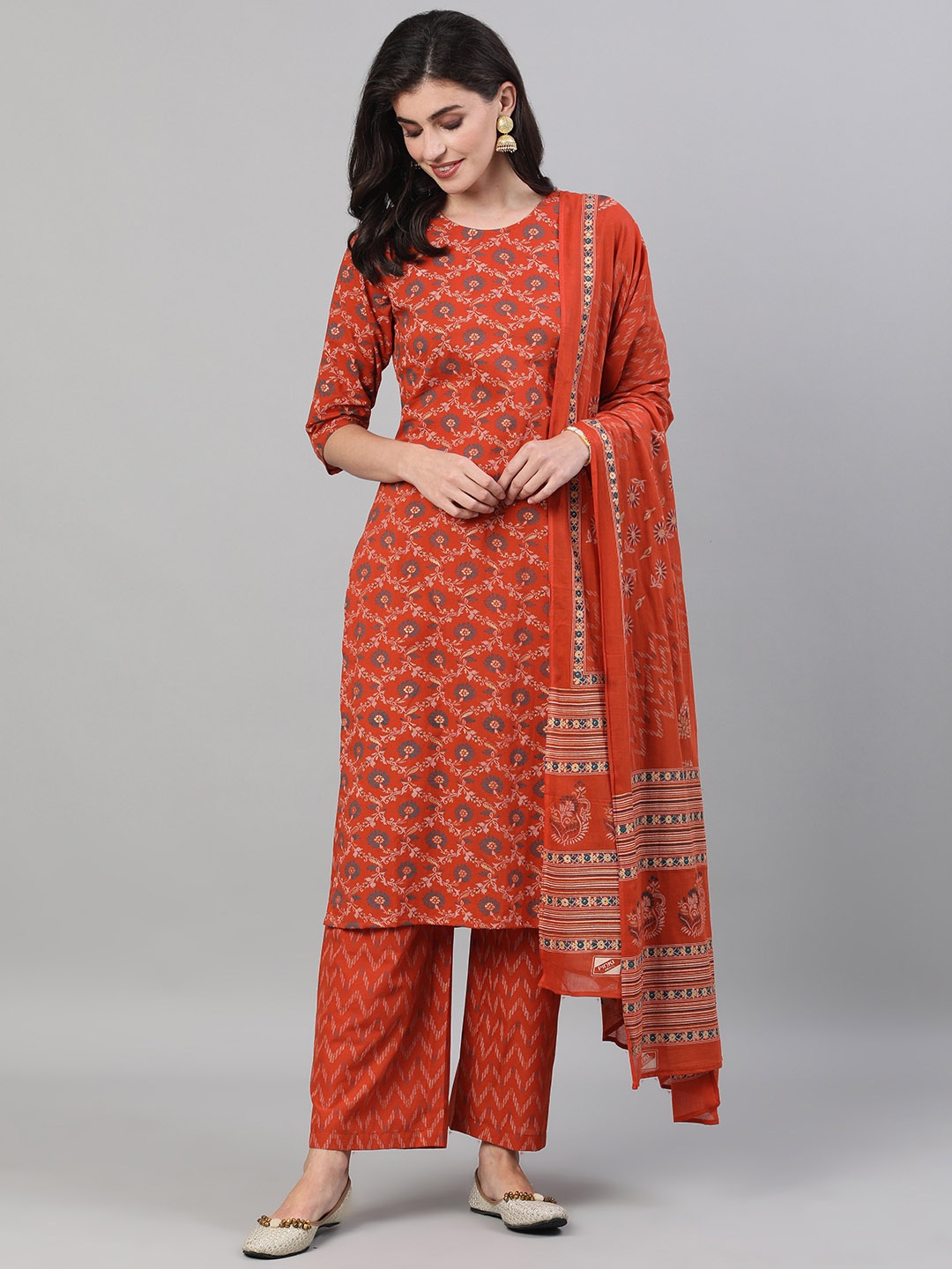 

Nayo Women Rust Printed Kurta with Trousers & Dupatta