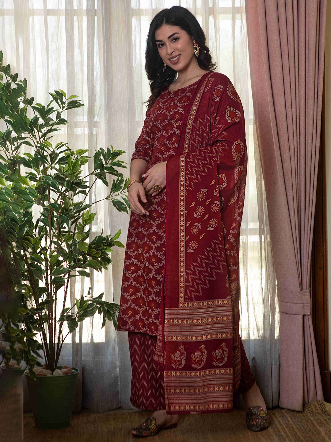 

Nayo Women Burgundy Printed Kurta with Palazzos & Dupatta