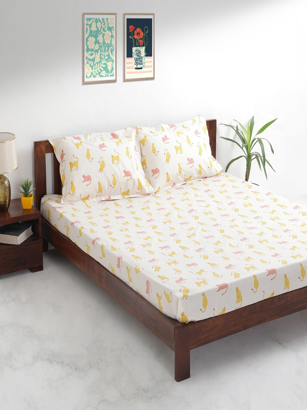

Chumbak White & Yellow Conversational 144 TC Cotton 1 King Bedsheet with 2 Pillow Covers