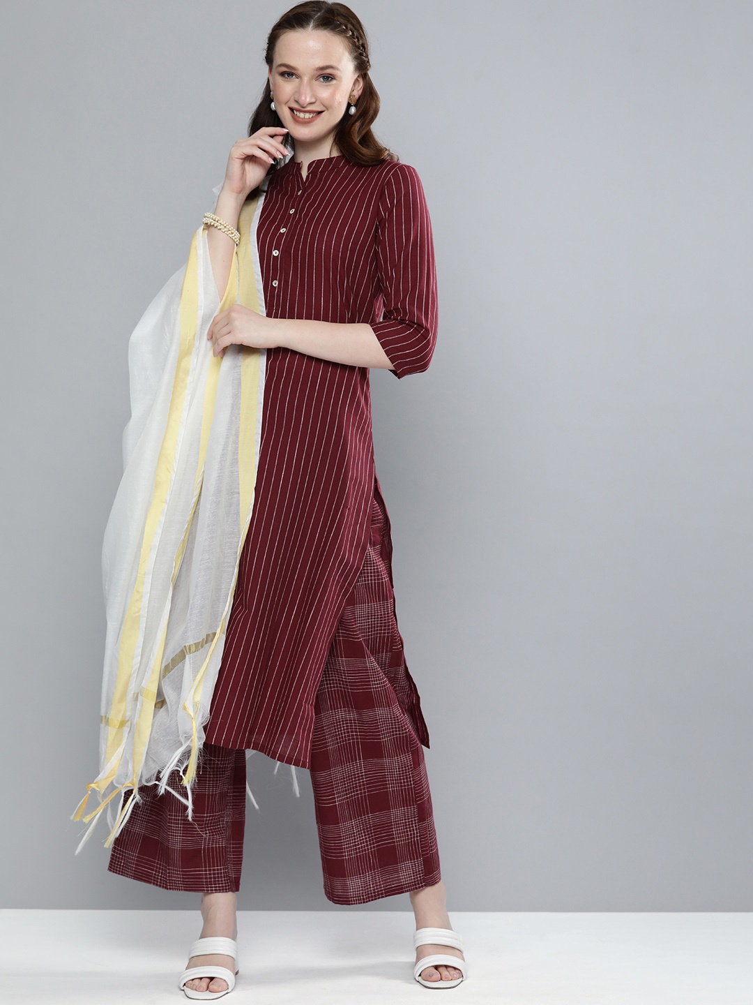 

Vishudh Women Maroon & White Striped Kurta with Palazzos & Dupatta