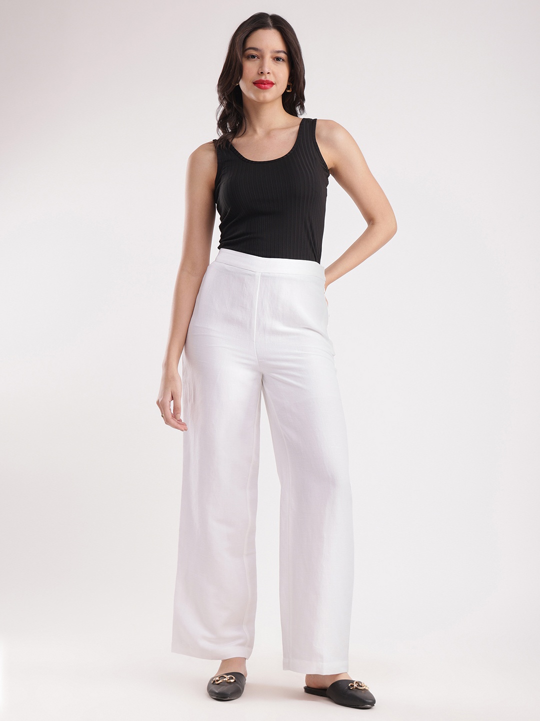 

FableStreet Women White Flared Solid Parallel Trousers