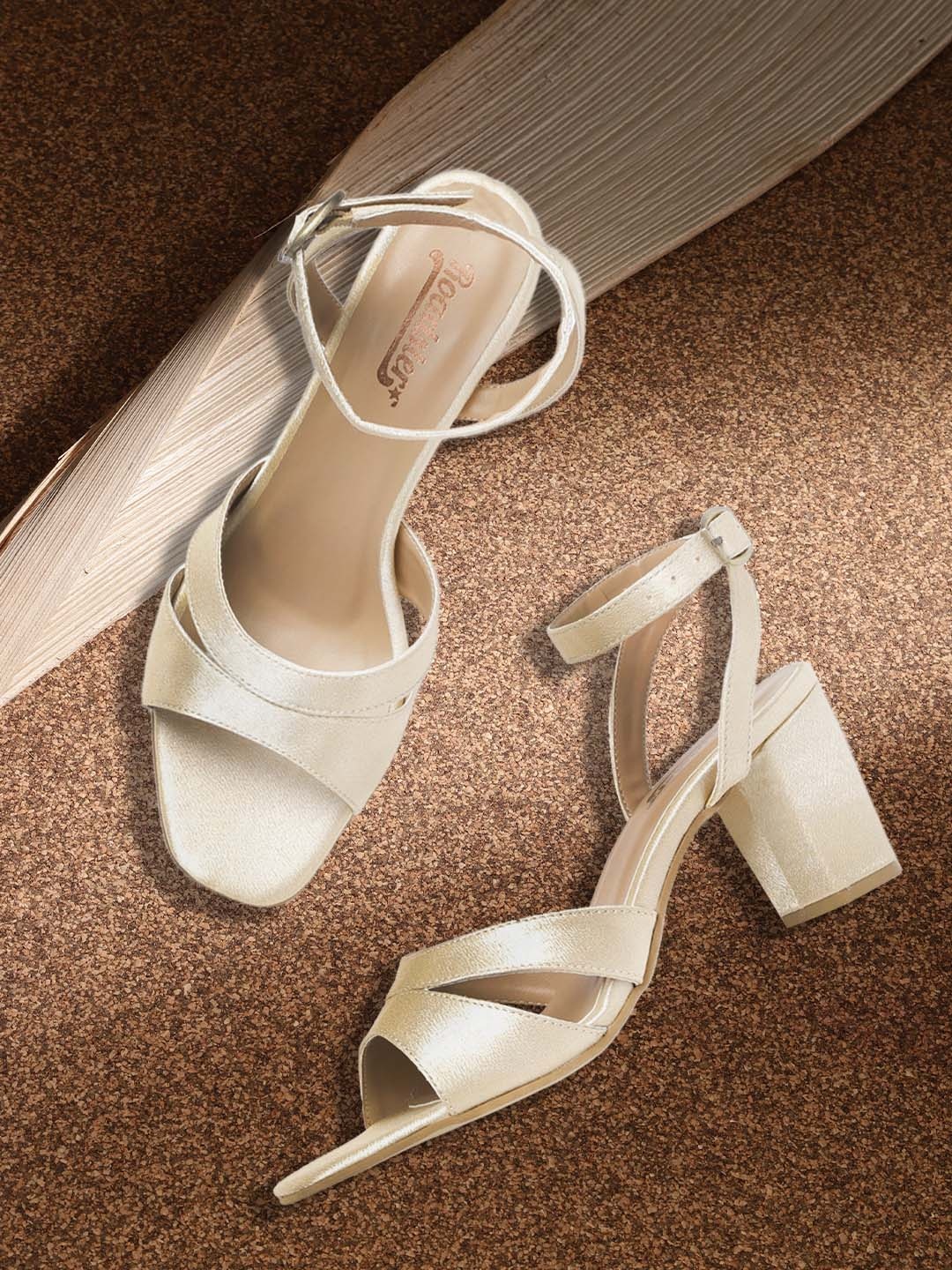 

Roadster Women Gold-Toned Solid Satin Finish Heels with Cut-Outs