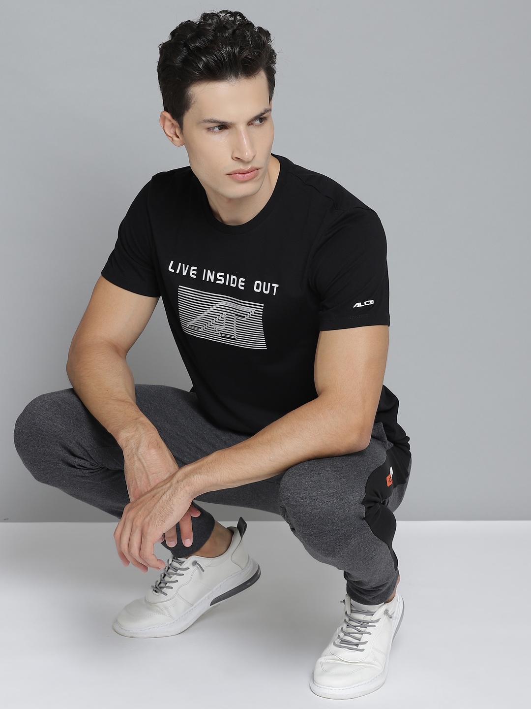 

Alcis Men Black & Silver Printed Round Neck T-shirt