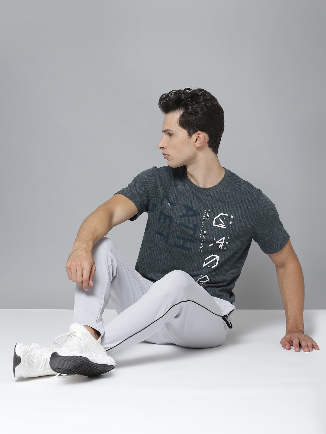 

Alcis Men Green & White Printed Round Neck T-shirt